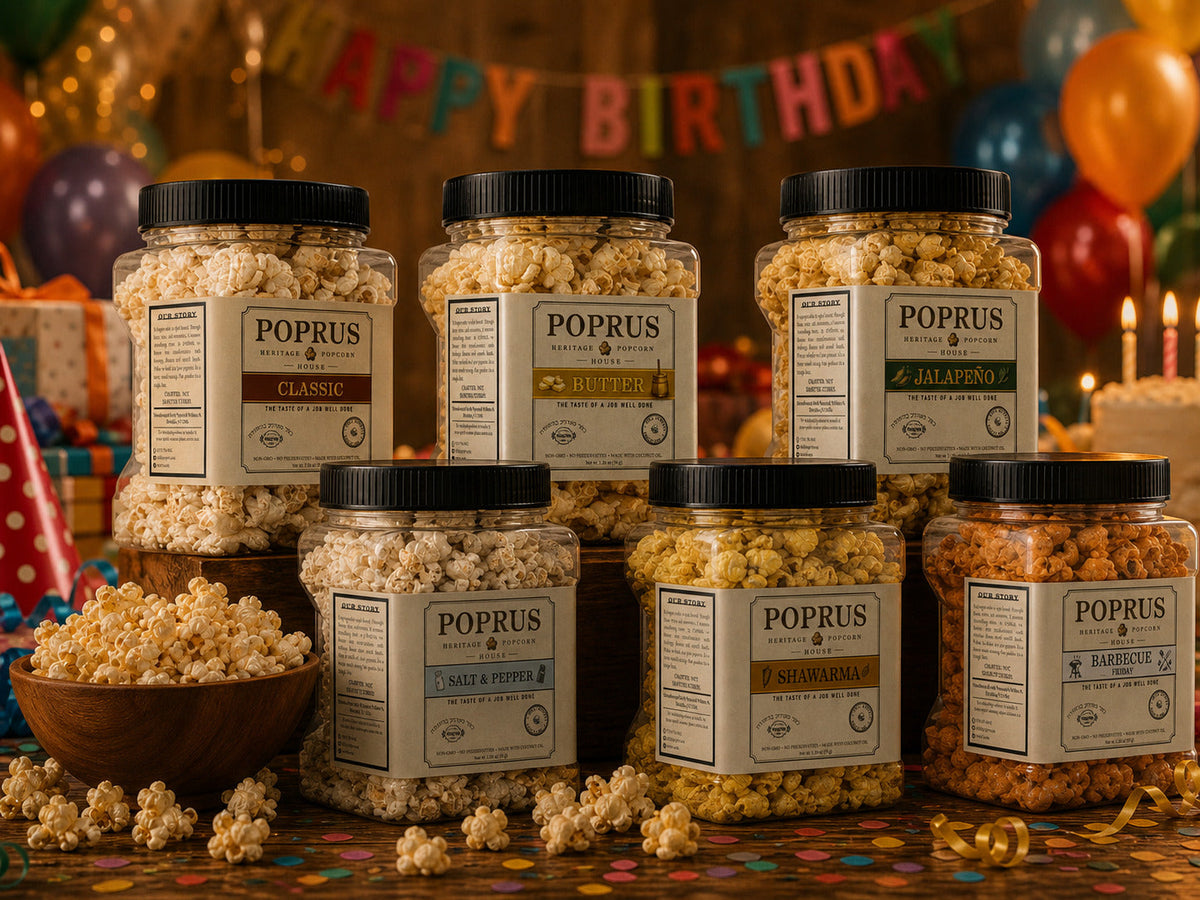 Six jars of POPRUS popcorn on a party table with balloons and gifts
